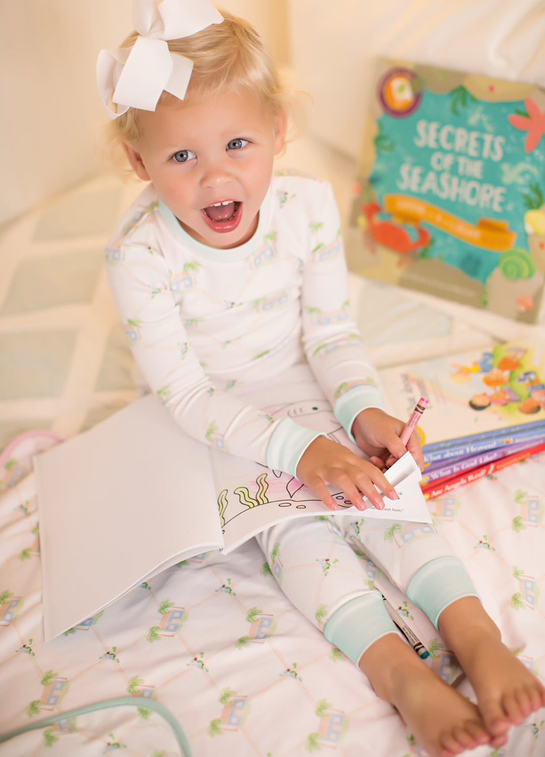 Toddler wearing the Signature Print Youth Long Set with Cozy Green Trim